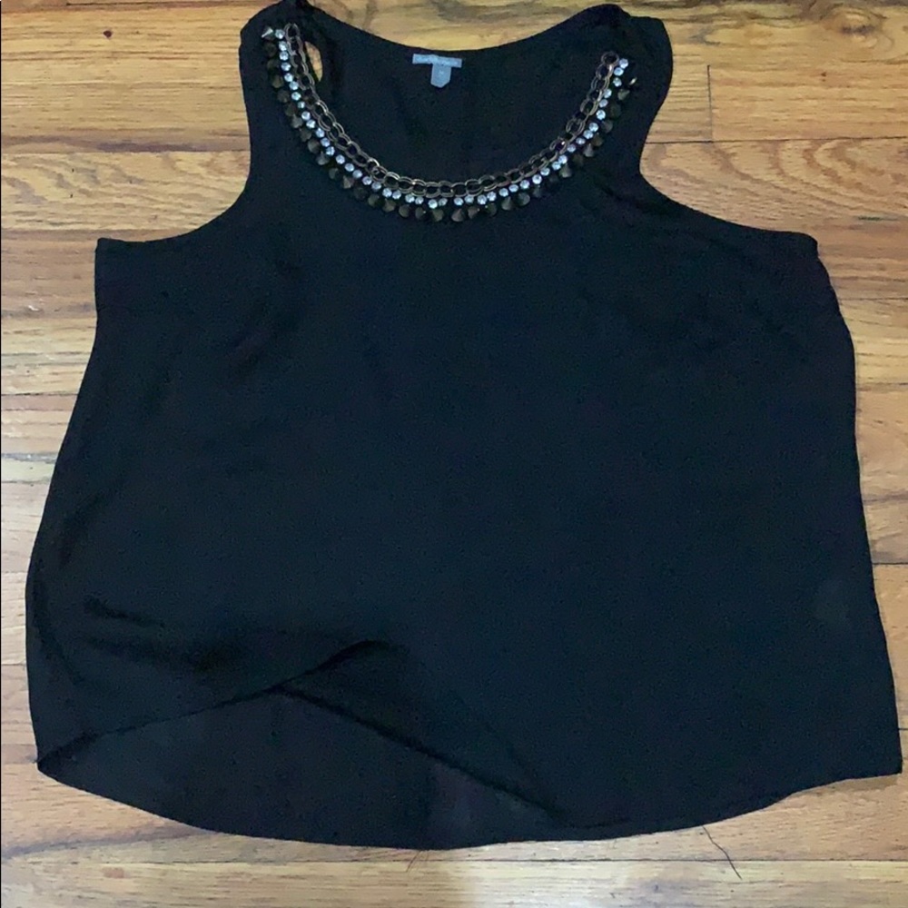Black blouse with beaded necklaces